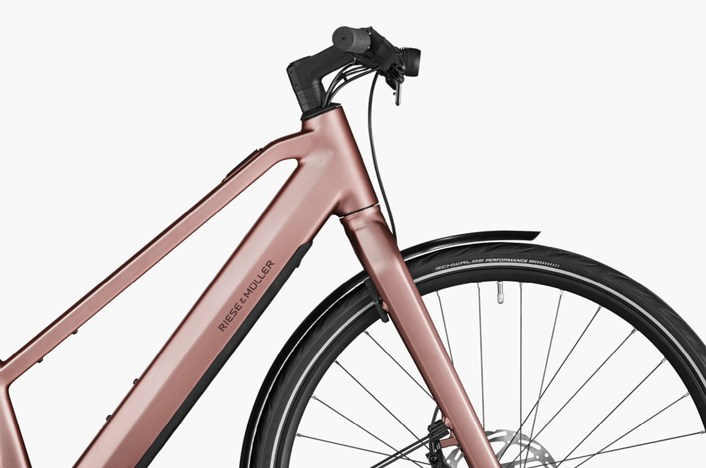 Close-up of the frame of the Riese & Müller UBN Seven Silent electric bike in rose color
