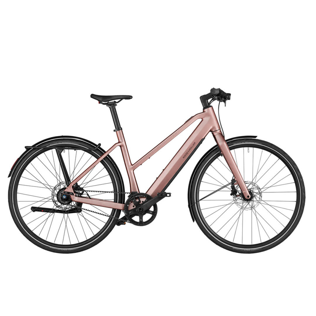 Rose-colored Riese & Müller UBN Seven Silent electric bike with sleek urban frame and belt drive.